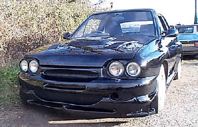 The full Mirage WRC package plus M3 mirrors, and Clio bonnet vent