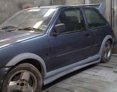 Animal arches/skirts and tailgate spoiler